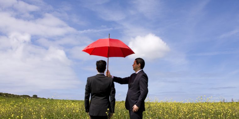 business man holding umbrella Potosi MO